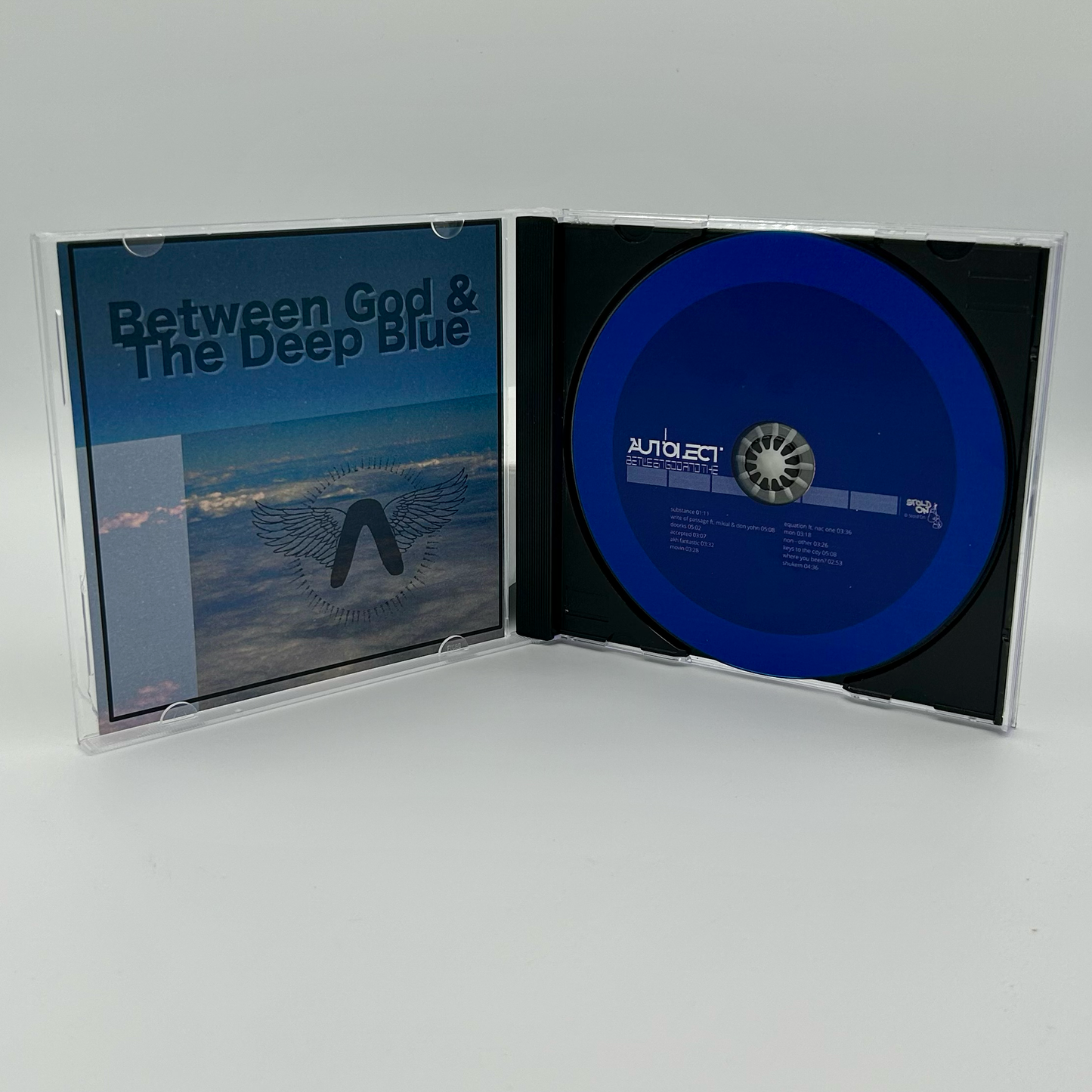 Autolect - Between God & The Deep Blue (CDr, Album, RE)